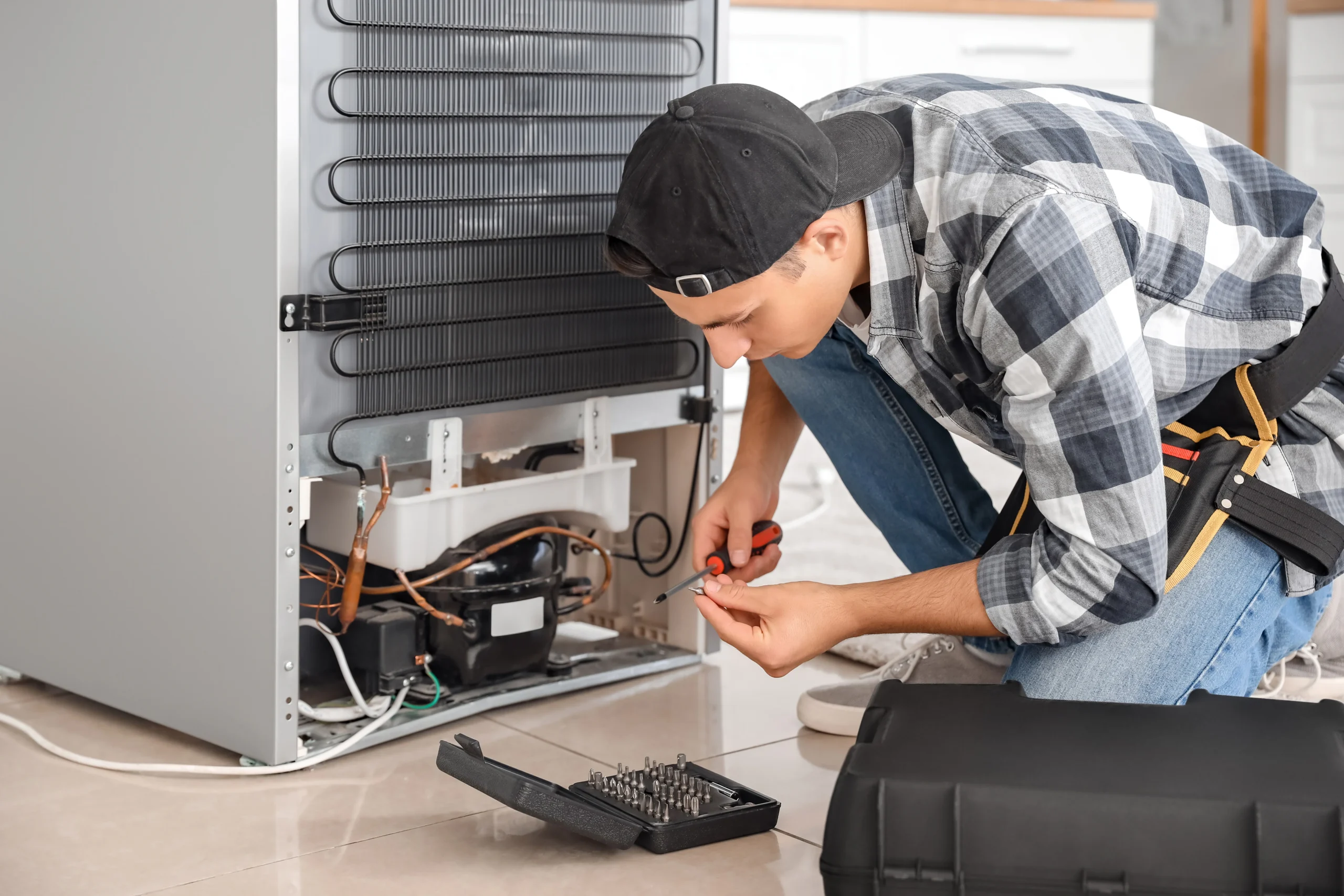 Fridge Repair Service in Najafgarh by Quick Home Fix technician