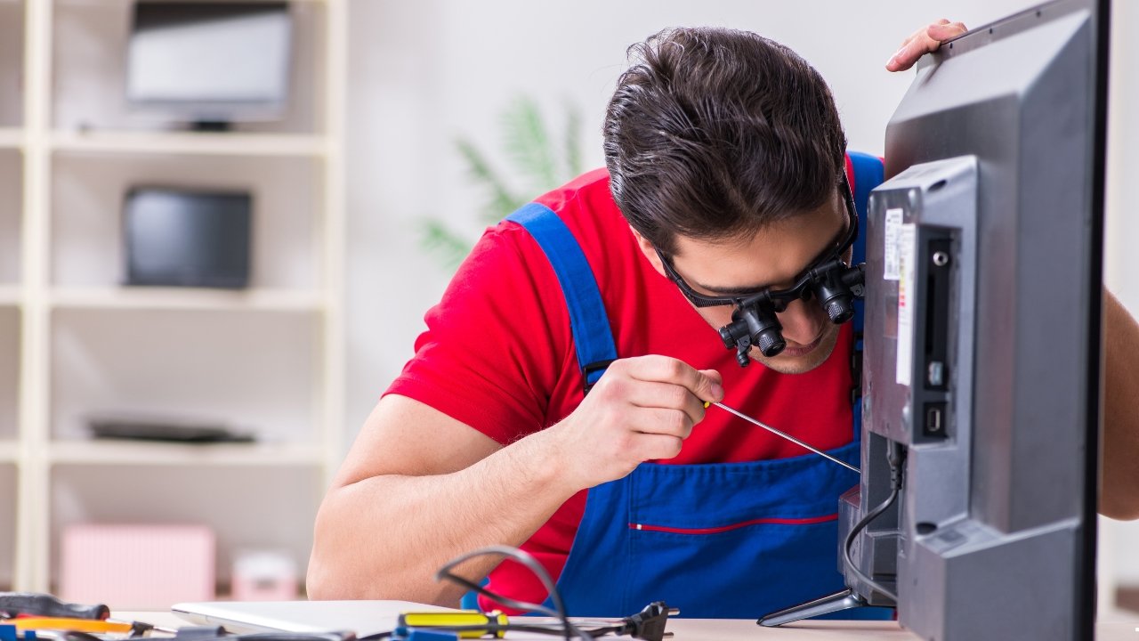 TV Repair Service in Basant Kunj by Quick Home Fix technicians repairing LED Smart TV at home